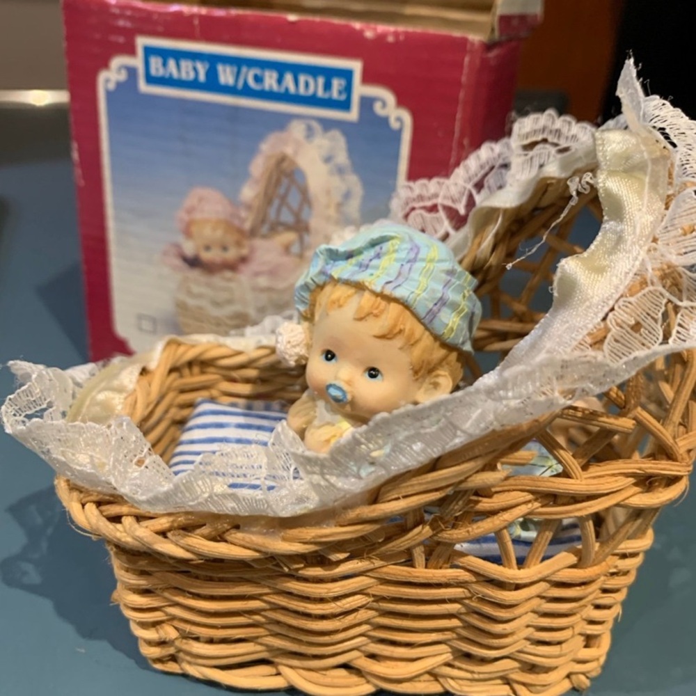 Porcelain Baby Figurine in Cradle